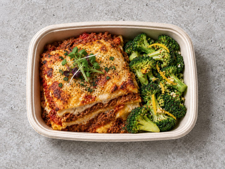Plant Based "Meat Zero" Lasagna Gratin with pomodoro sauce, vegan bechamel, citrus garlic broccoli. Cuseho bento catering, Singapore
