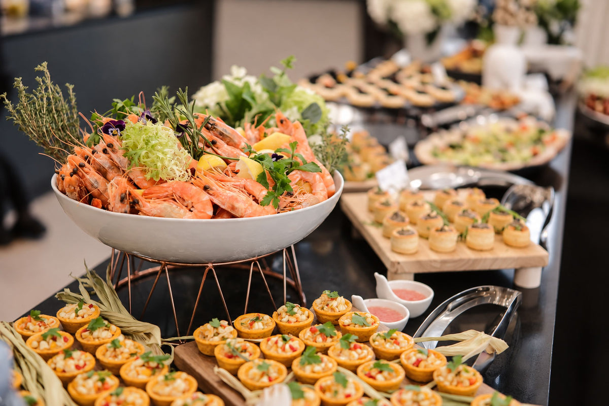 Buffet spread with seafood platters and tartlets set up for guests. Cuseho full-service buffet catering, Singapore