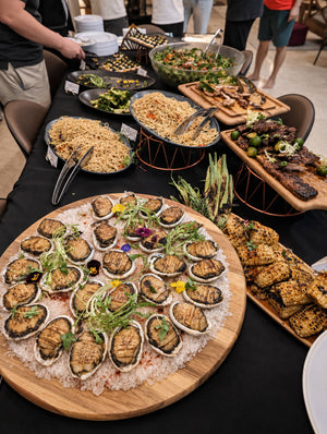 Buffet table with noodle and pasta platters. Cuseho rice and noodle live station catering, Singapore
