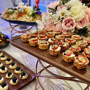 Crisp waffle cups topped with tomato and fresh cheese. Cuseho appetisers live station catering, Singapore