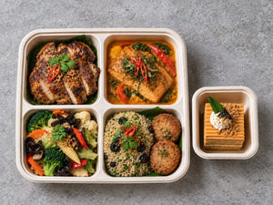 Thai Sawadee with grilled lemongrass chicken thigh, norweigian salmon with choo chee curry, vegetable chop suey with garlic soy. Cuseho bento catering, Singapore