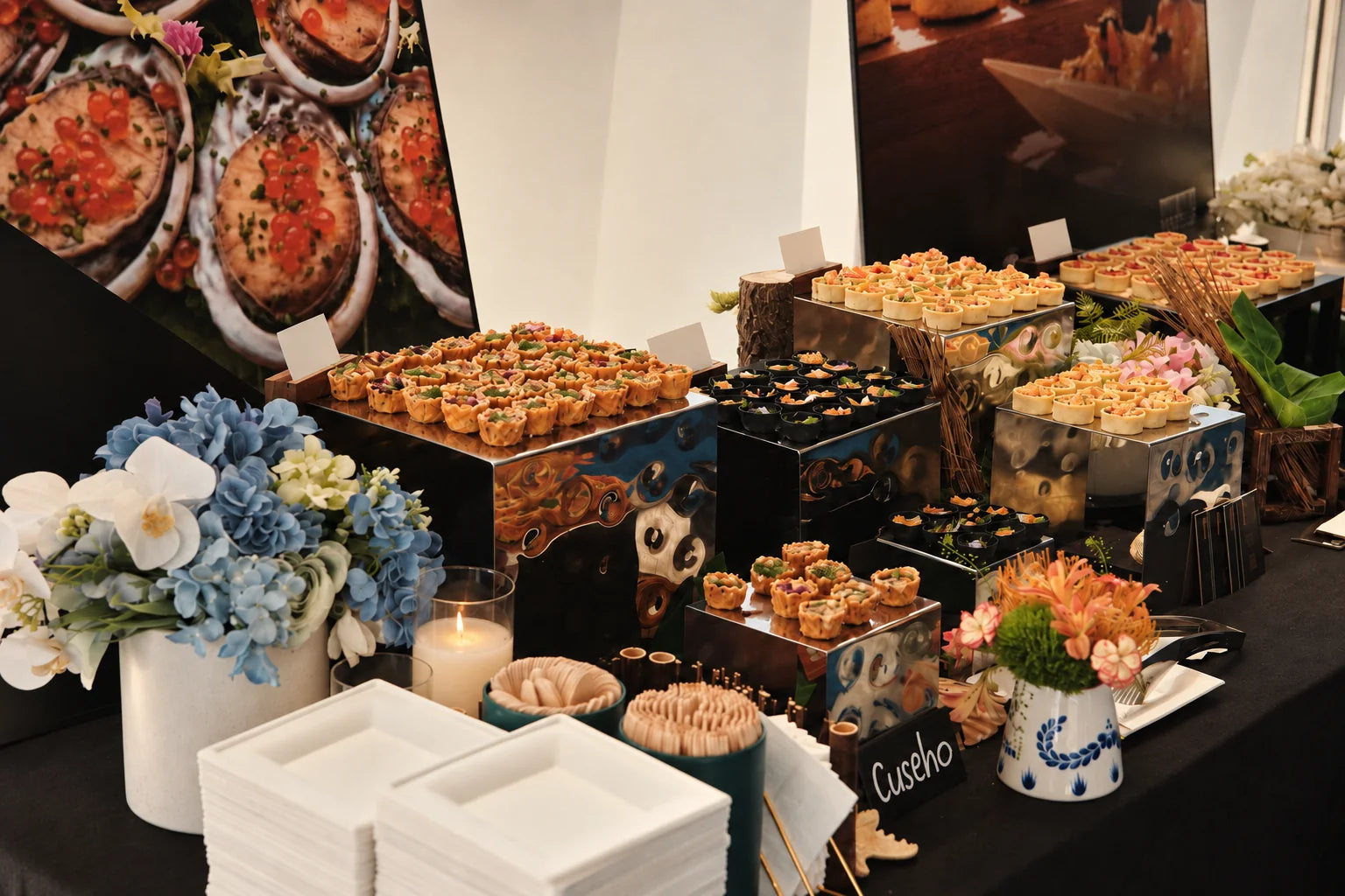 Bite-sized canapés arranged on tiered buffet stands