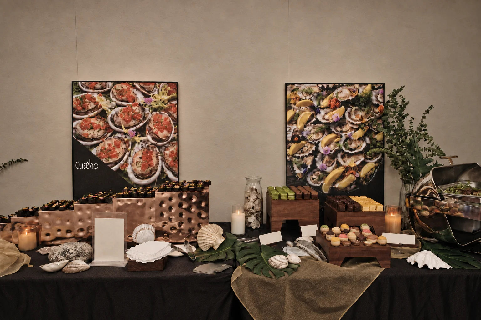 Tea break bites neatly arranged on a long table for an office event. Cuseho tea break catering, Singapore